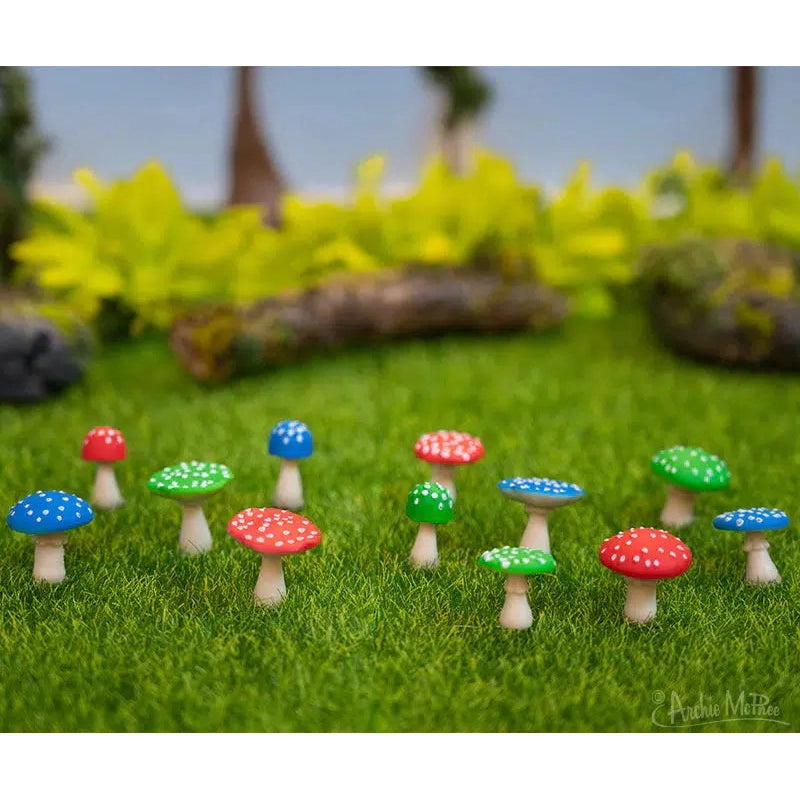 Front view of Itty Bitty Mushrooms-Bag of 12 posed outside in grass.