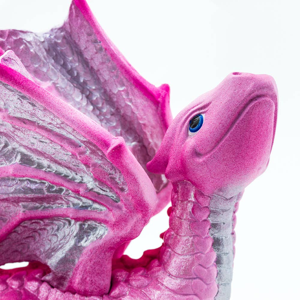 Close-up view of the side profile of the Baby Love Dragon&#39;s face and wings.