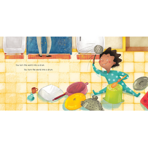 Front view of an inside page of the book Everything a Drum featuring the boy drumming on pots and pans.