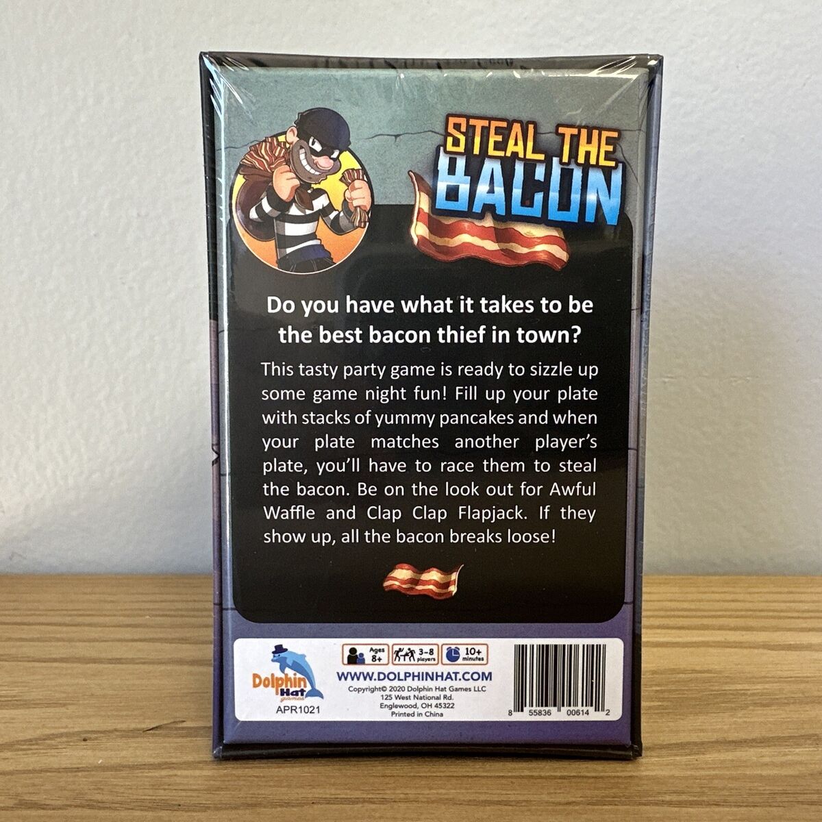 Rear view of the Steal The Bacon-Game in its box.