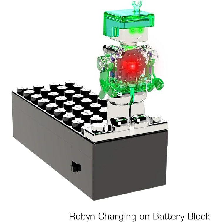 Front view of Robyn charging on the battery pack against a white background.