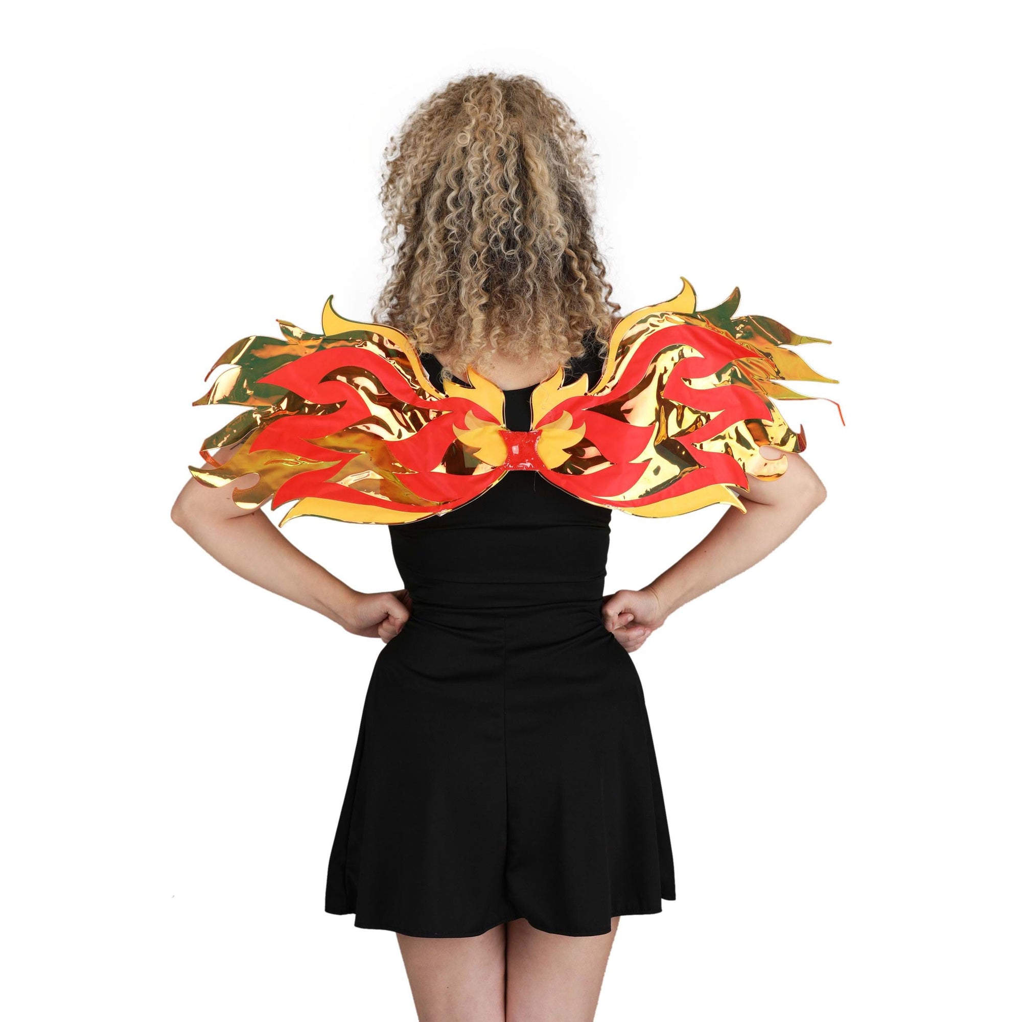 Front view of a woman wearing the Adult Fire Wings.