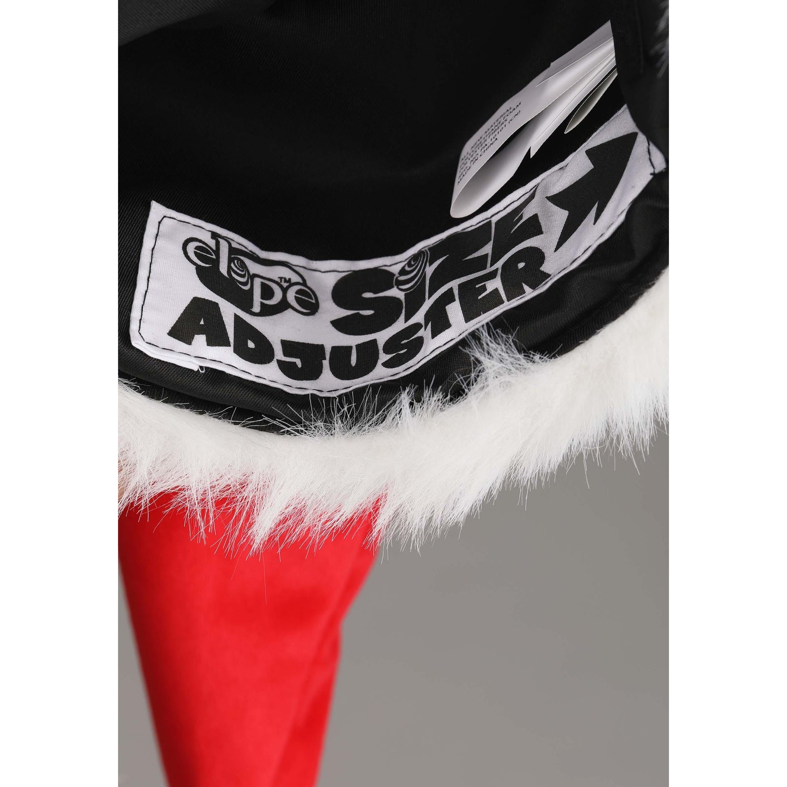 Front view of a man wearing a Jack Skellington Santa Hat.
