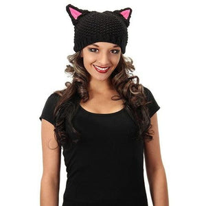 Front view of a woman wearing the cat knit hat.