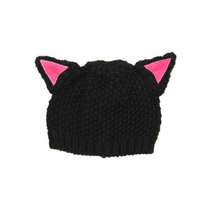 Front view of the knit cat hat against a white background.