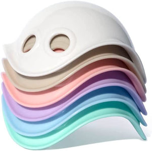 Front view of the Bilibo Mini 6 Color Combo Pack Pastels out of packaging and stacked showing the colors: white, beige, pink, lilac, ice  blue, and mint green.