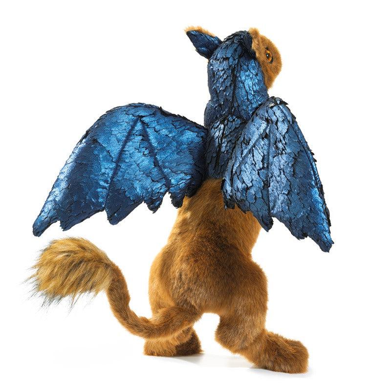 Rear view of the Griffin-Puppet standing on his rear legs.