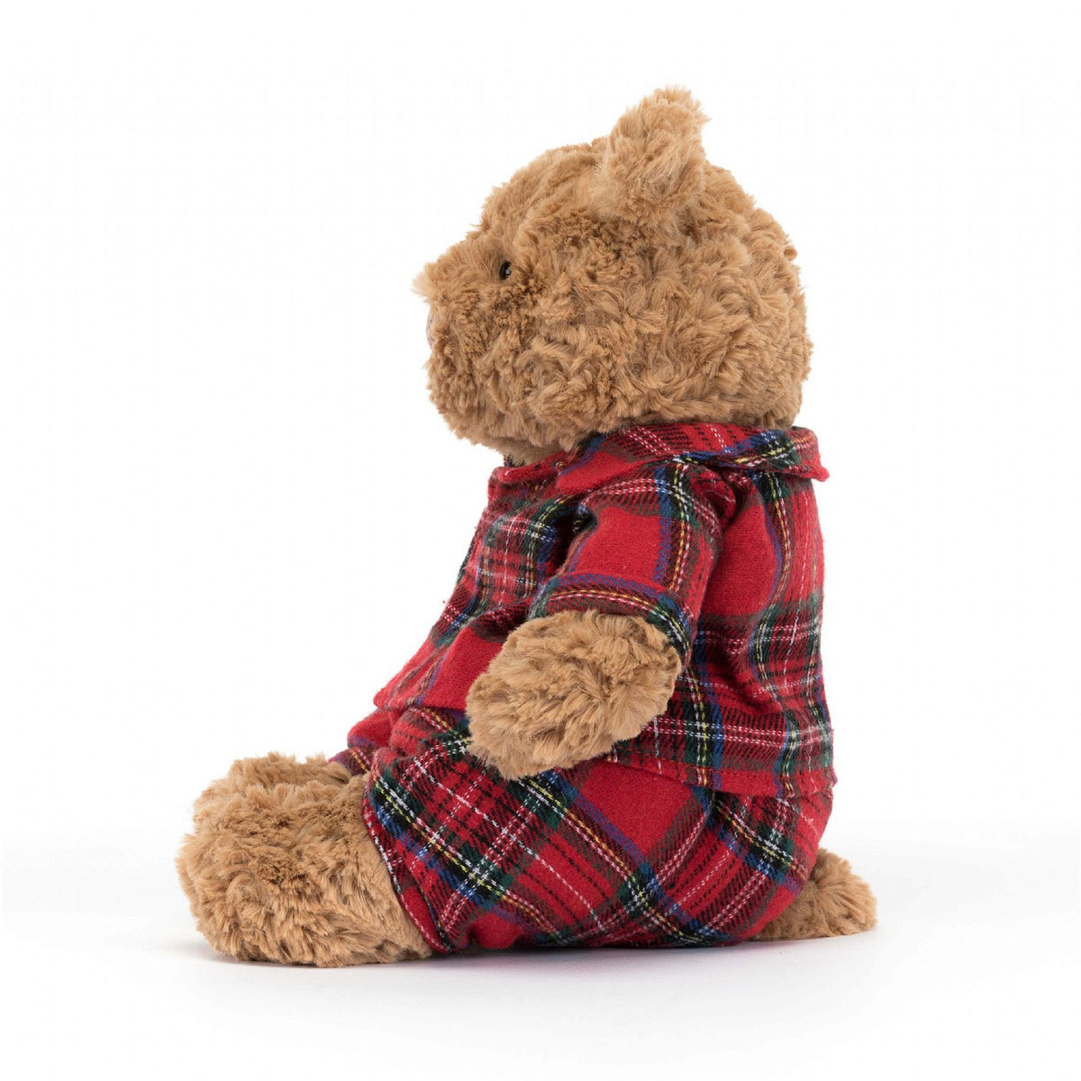 Front side view of Bartholomew Bear Bedtime-Medium 10-Inch in his red pad pjs and sitting.