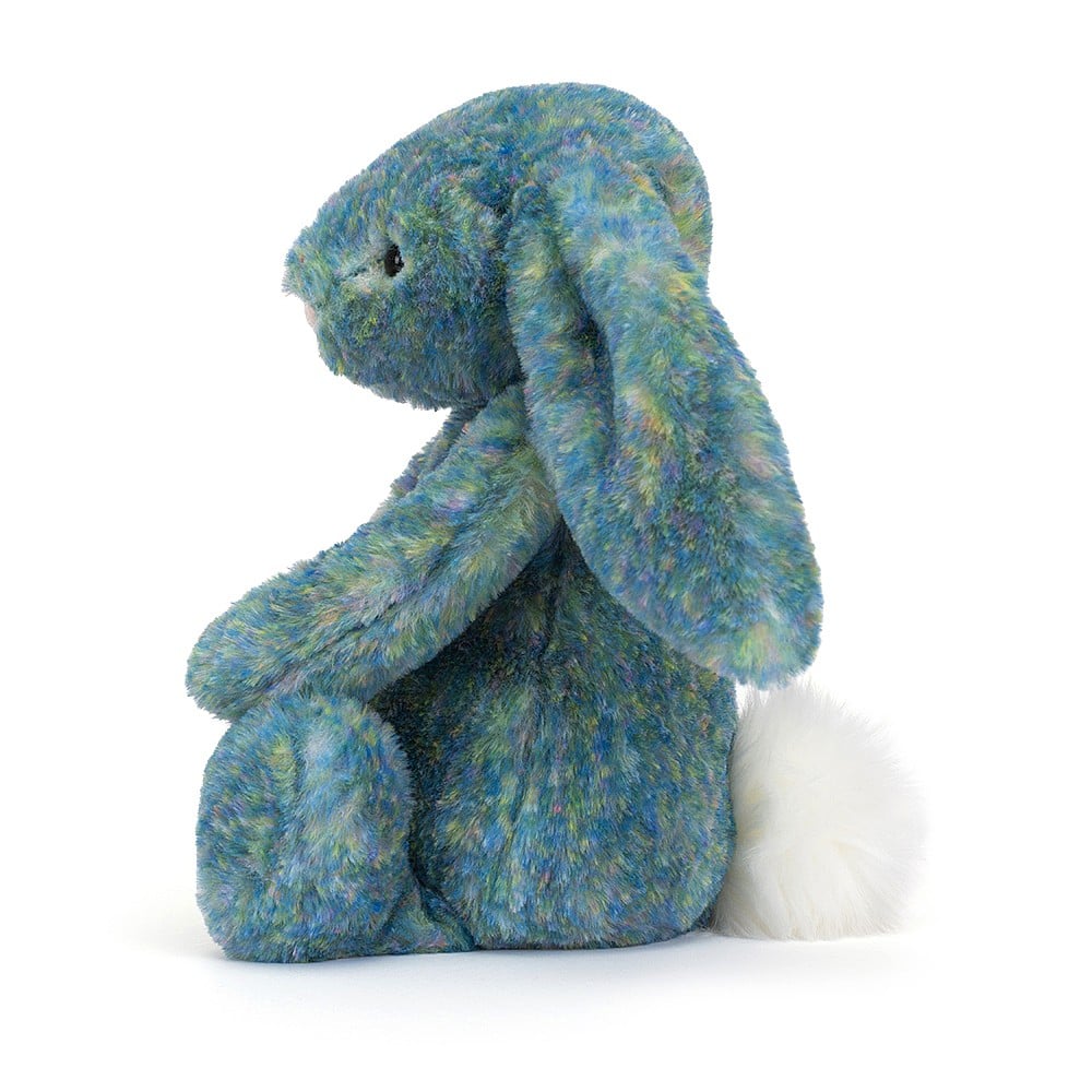 Front left side view of the Bashful Luxe Bunny Azure Medium-12&quot; sitting.
