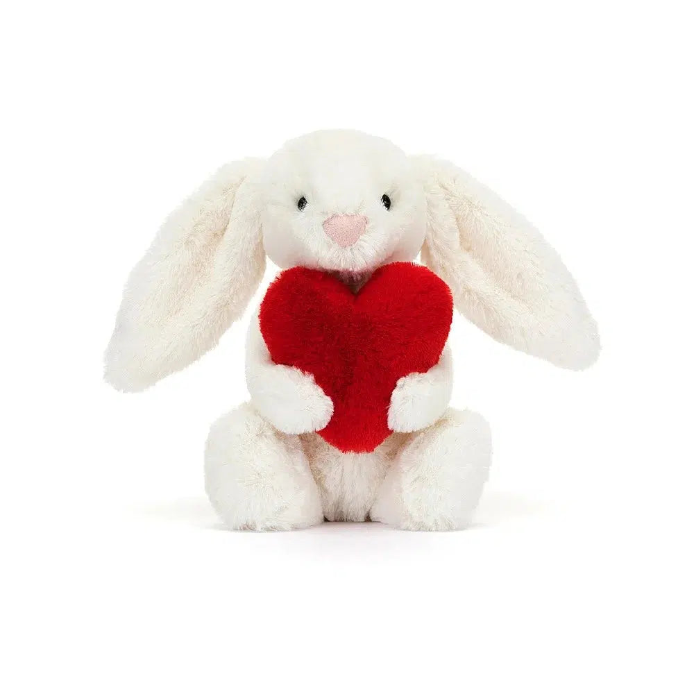 Front view of Jellycat Bashful Little Heart Bunny 7&quot; holding the red heart.