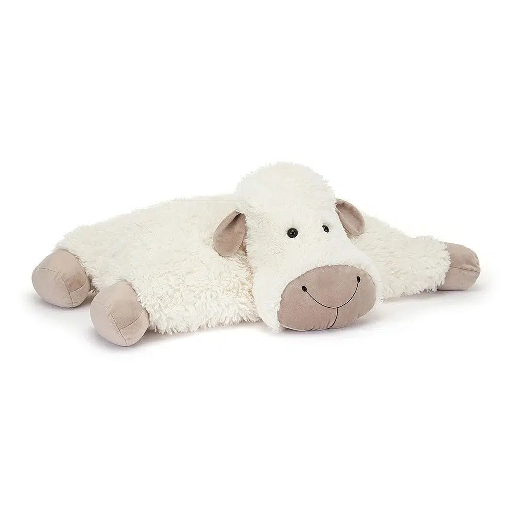 Front slight side view of Truffles Sheep-Large laying on belly with arms and legs out to the side.