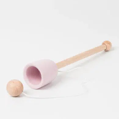 Front view of pink Wooden Cup & Ball Toy.