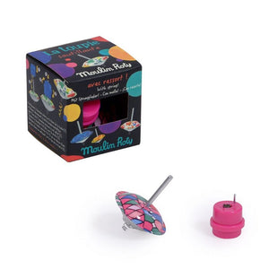 Front view of Les Petites Merveilles Hopping Spinning Top in box and with top outside of box.