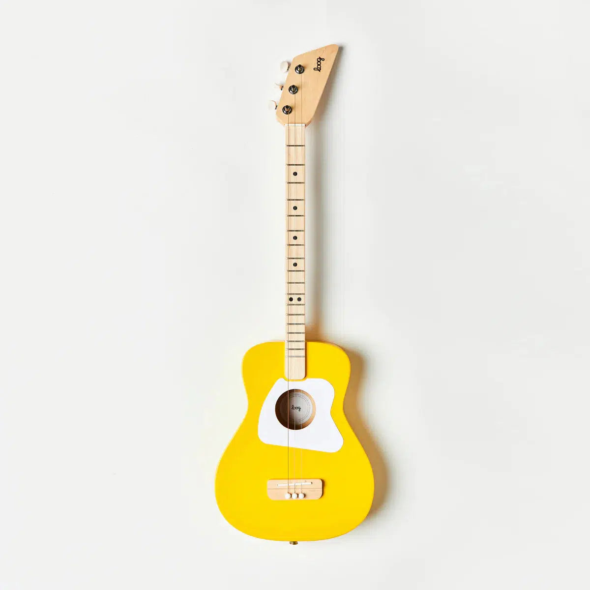 Front view of the yellow acoustic guitar against a white background.