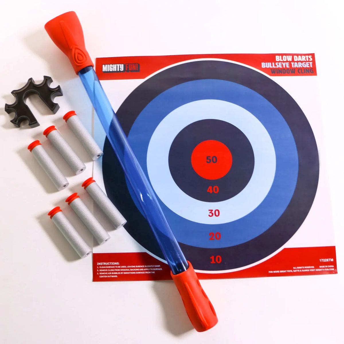 Front view of contents from Blow Darts Set including target, shooter, and darts.