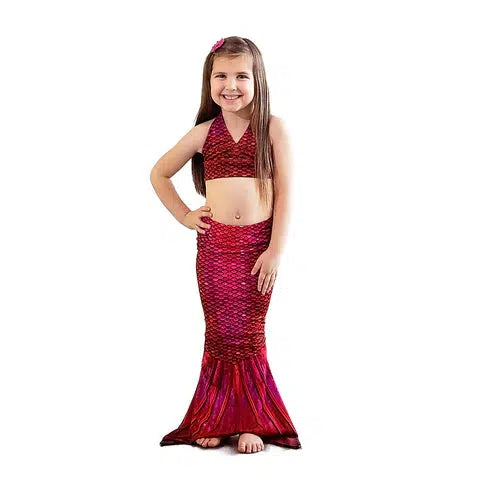 Front view of a young girl standing wearing the Fiji Red Mermaid Tail.