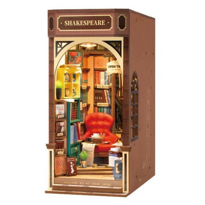 Shakespeare-themed bookshelf with a cozy reading nook inside