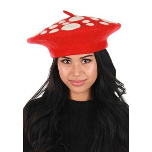 Front view of a woman wearing the mushroom hat.