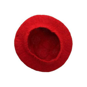 Bottom view of the mushroom hat against a white background.