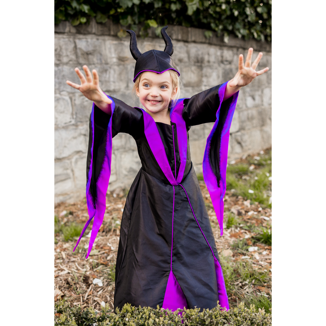Smiling girl wearing dress and headpiece