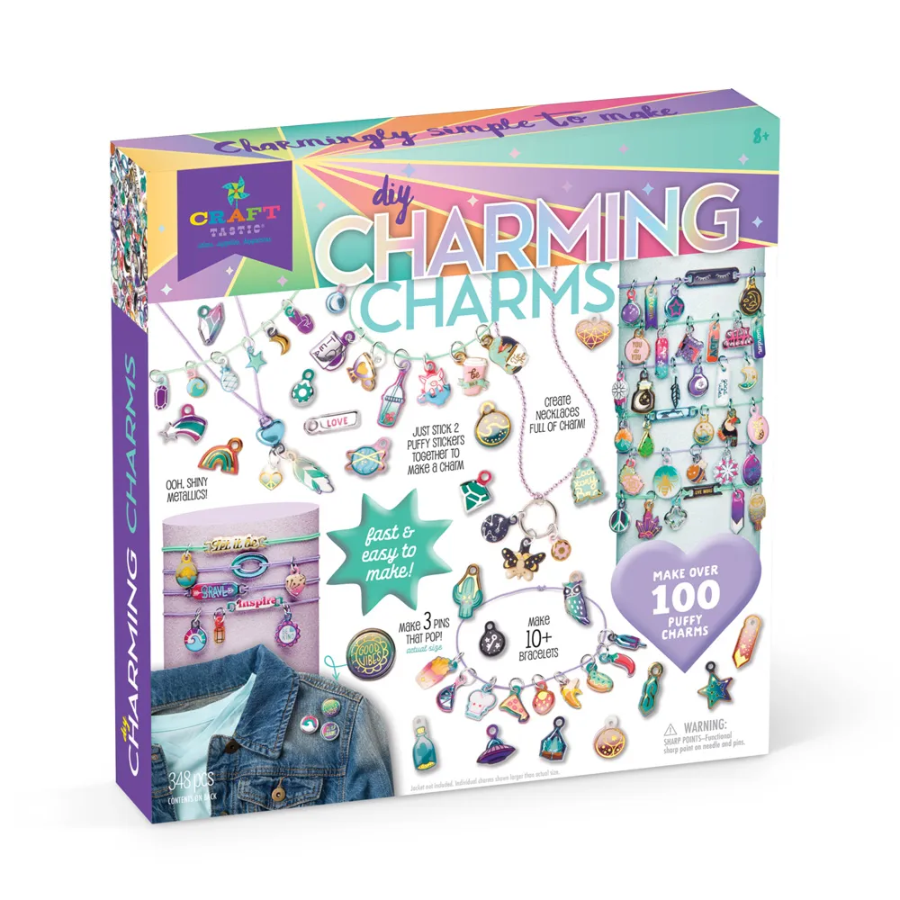 Front of box depicting lots of charms