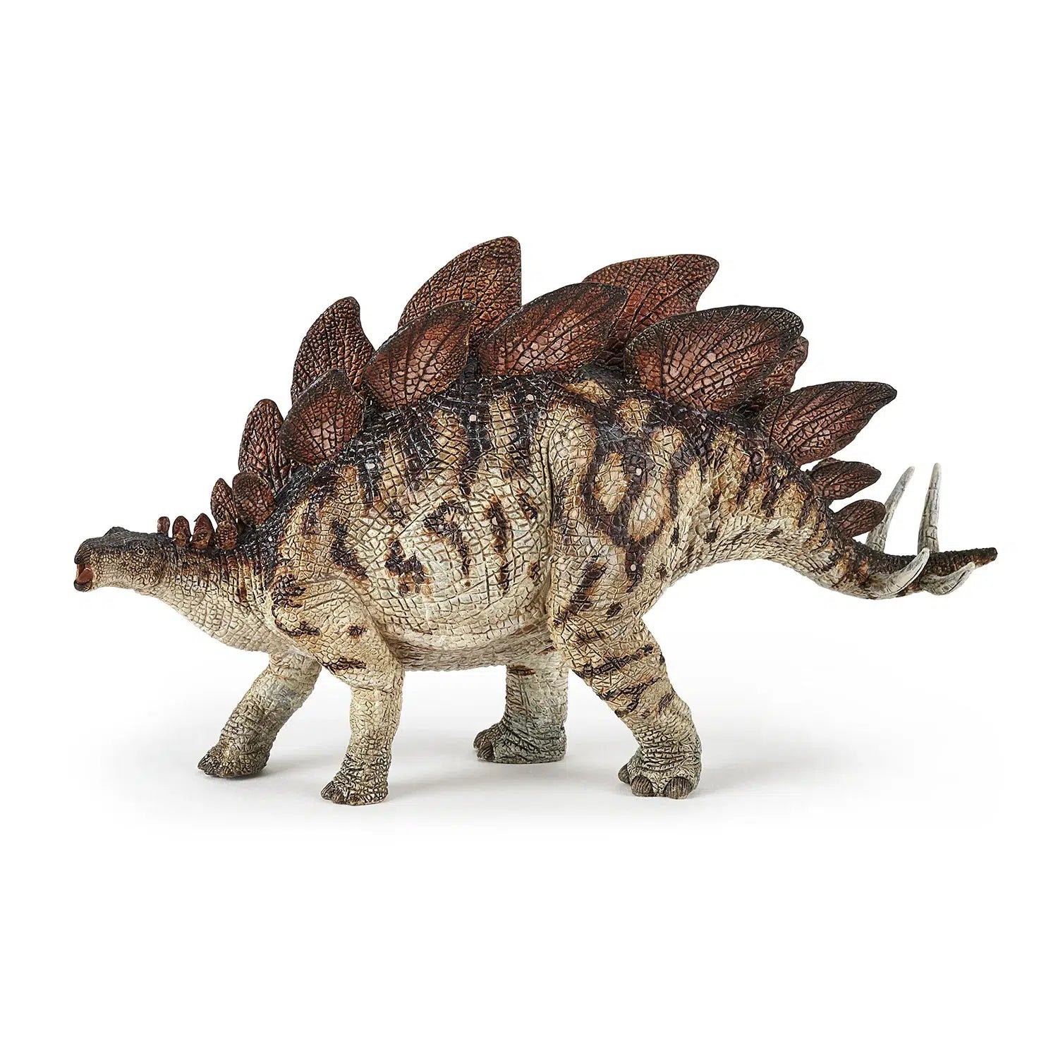 Side view of the Stegosaurus figurine.