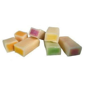 Front view of the variety of flavors of HI-CHEWs unwrapped and showing the flavors in the middle.