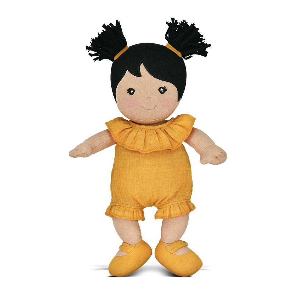 Front view of organic doll Gwen standing on a white background.