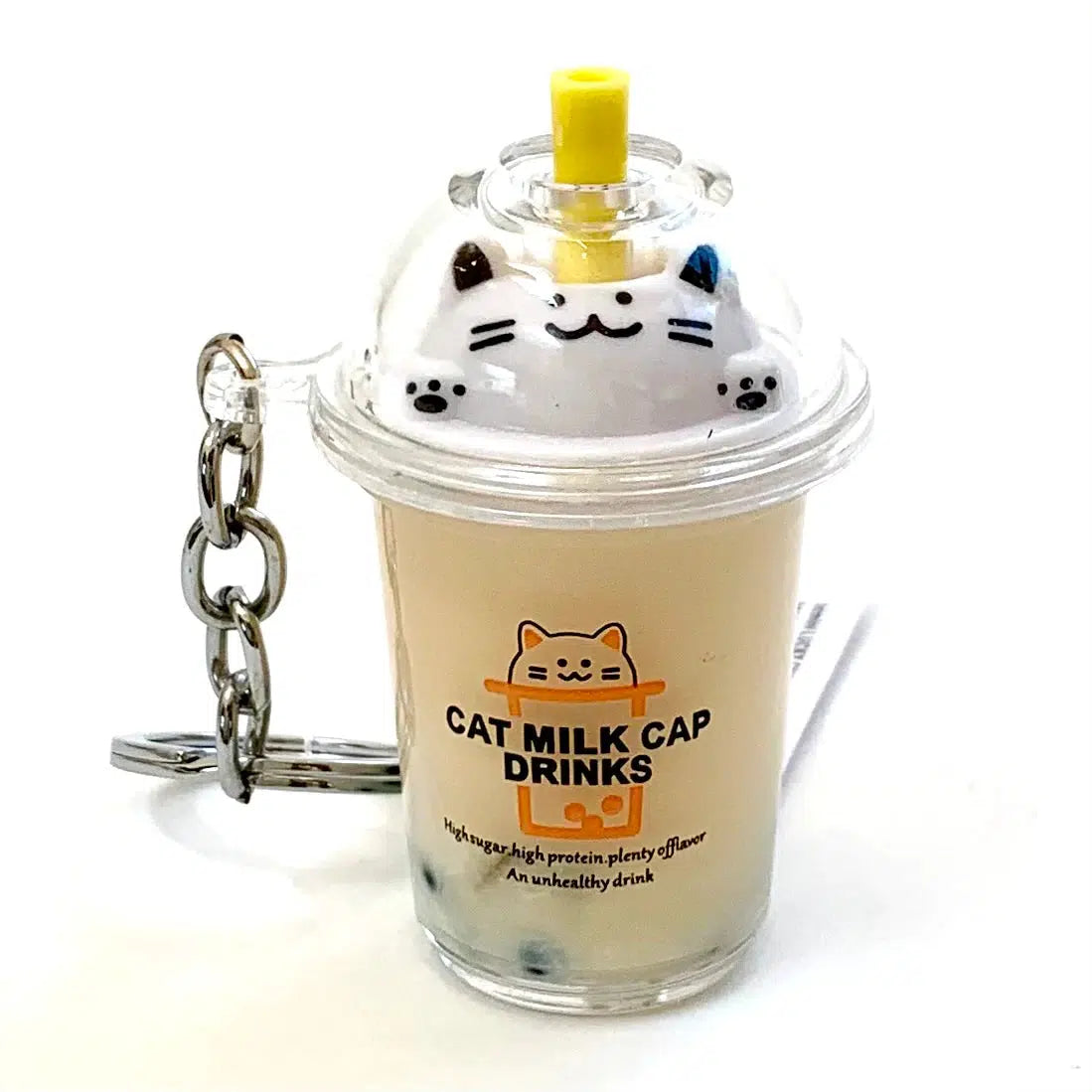 Front view of tan liquid boba cat standing up.