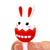 Front view of the red Bunny Egg Gel Pen being held at top of pen showing the red egg with the bunny heard in it.
