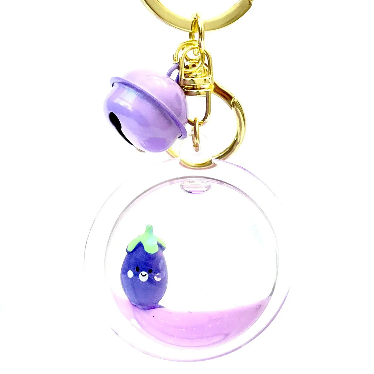 Front view of the saucer shaped Eggplant Floaty Key Charm showing the bell at the top of the keychain.