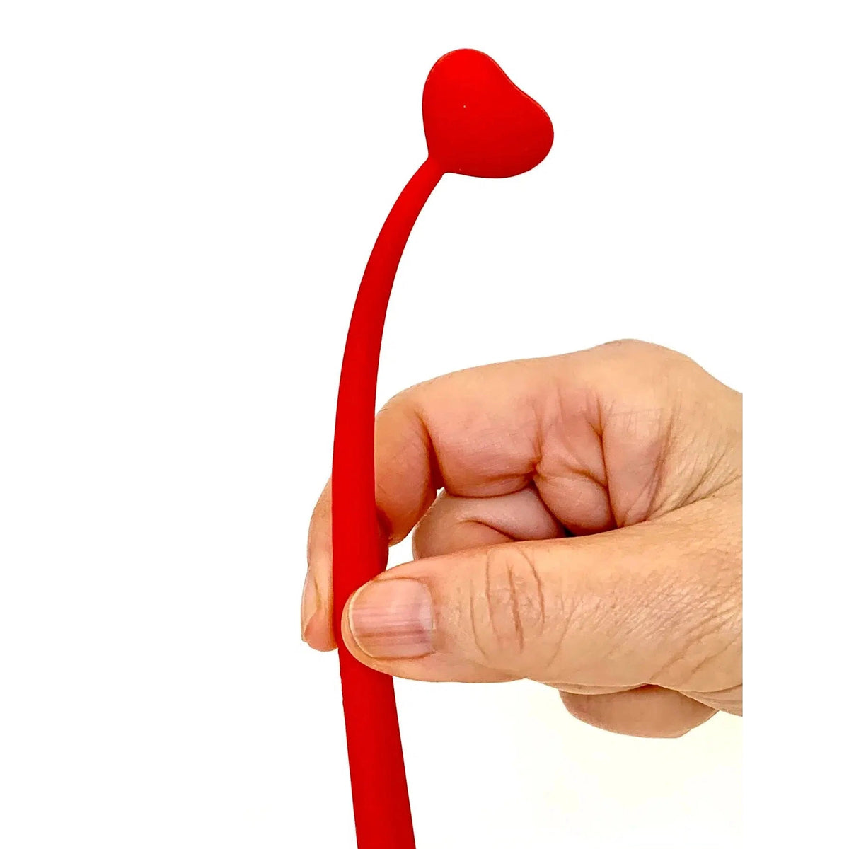 Front view of a person&#39;s hand bending the red Heart Wiggle Gel Pen about half way down showing how it bends.