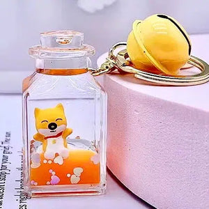 Front view of the bottle shaped Shiba Inu key charm.