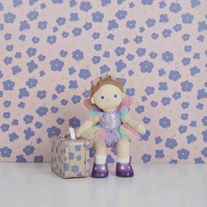 Front view of a Dinkum Doll wearing the fairy pretend pack. 