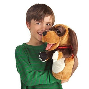 Dog stage puppet on hand. 