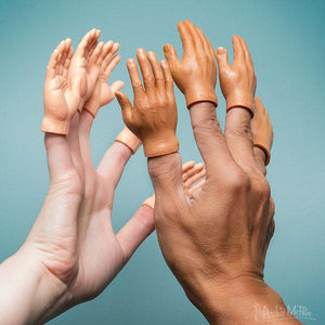 Front view of two hands in different skin tones with Finger Hands on them like they are going to high five.