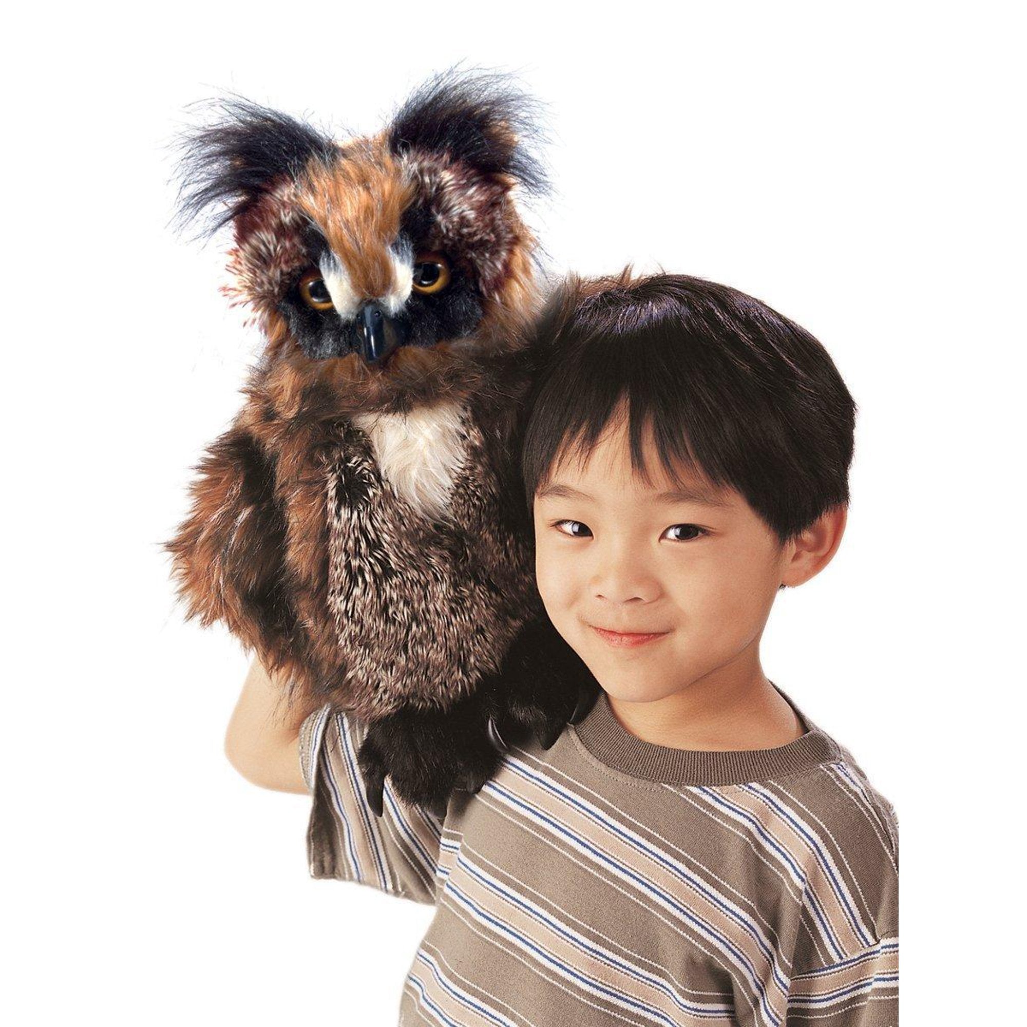 Front view of the Great Horned Owl Puppet posed on a branch.