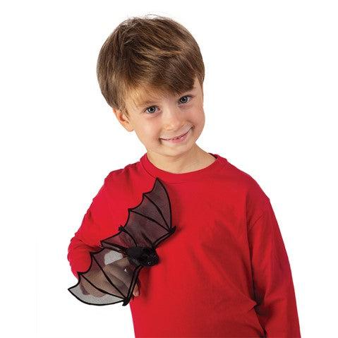 boy holding bat on his finger