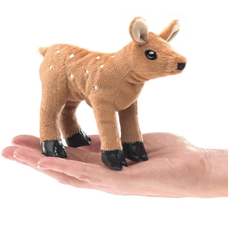 Mini fawn on palm of the hand