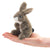 Front view of the Mini Jack Rabbit Finger Puppet sitting in a person's hand.