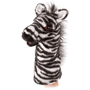 Front view of zebra stage puppet on someone's hand.