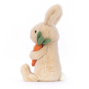 Front side view of Bonnie Bunny With Carrot showing the bunny holding the carrot.