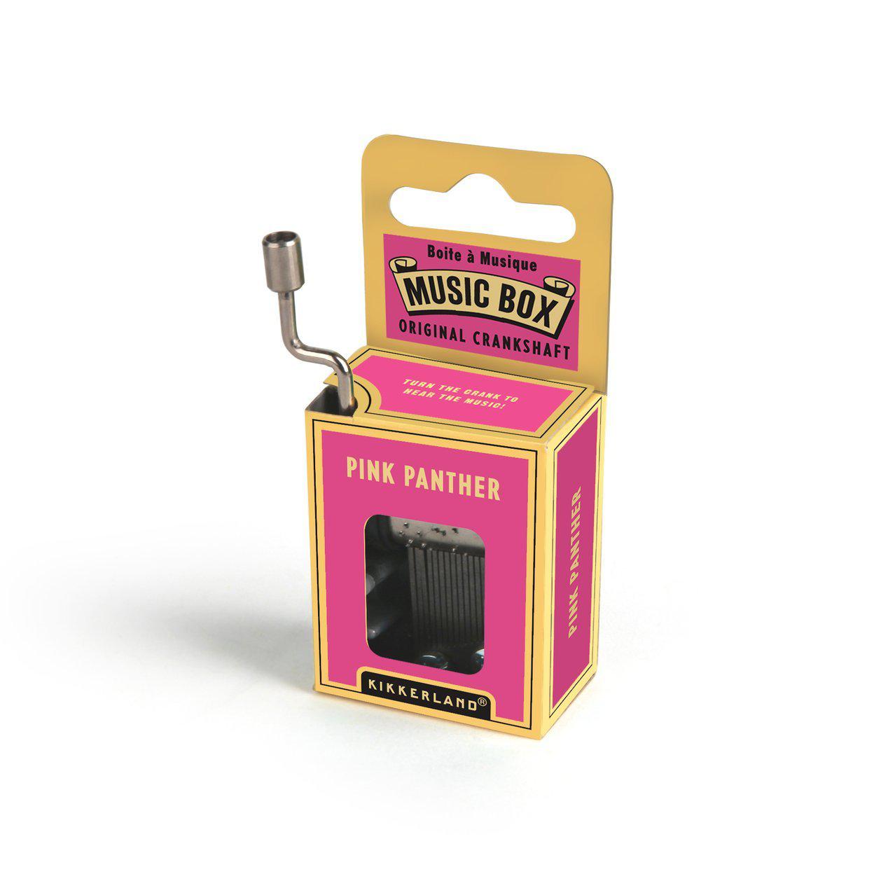 Front view of wind up music box pink panther in package