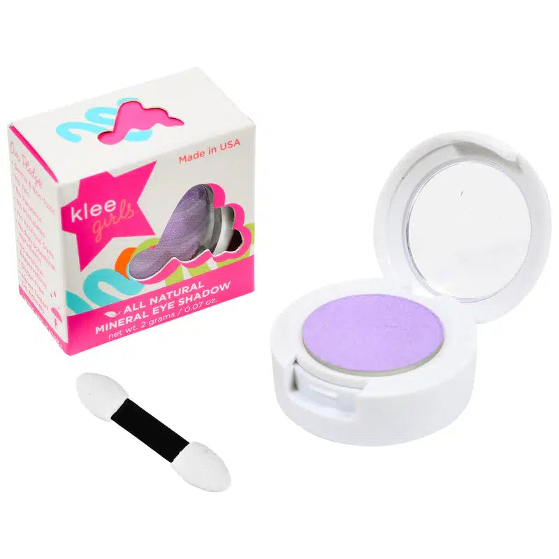 Front view of Klee Sugar Hill Bloom Eyeshadow in packaging with an open eyeshadow compact with eyeshadow applicator beside it.