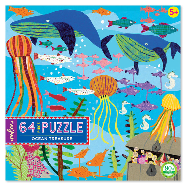 Puzzle box depicting an underwater scene with whales, jellyfish, fish, coral, and a treasure chest.
