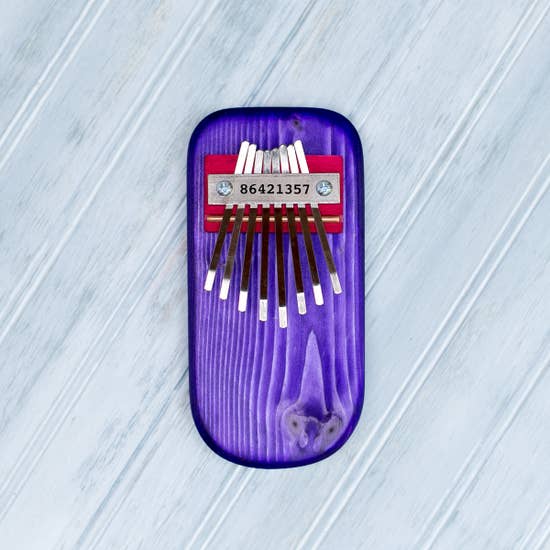 Front view of the purple Pine Kalimba.