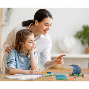 Front view of a mother and her daughter building with the STEM 101 set.