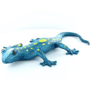 Front view of blue with yellow dots Lizard Squishimal.
