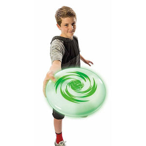Front view of a young boy holding a Nightzone Blaze Light up Disc.