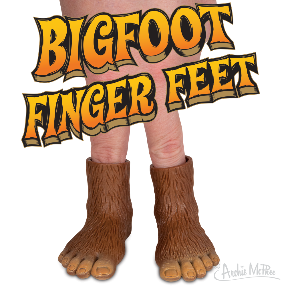Front view of a hand with 2 fingers inside of a left and right Bigfoot feet finger puppets.